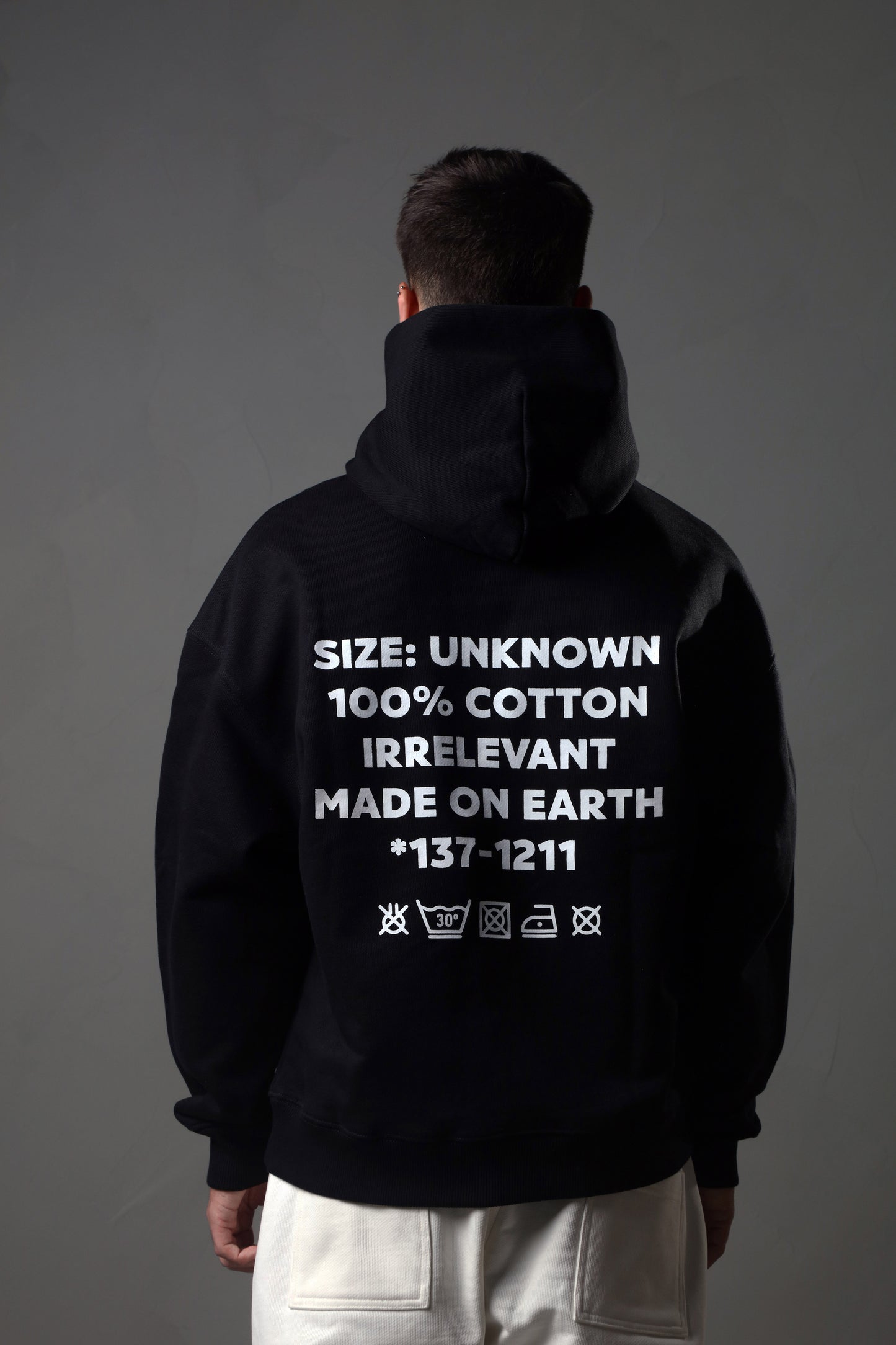Irrelevant wash care hoodie